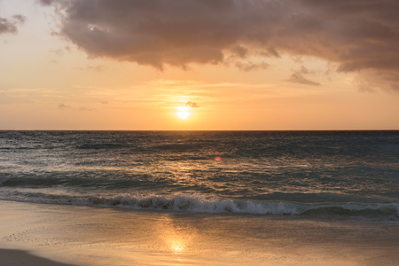 View of a tropical caribbean beach at sunset.の写真素材