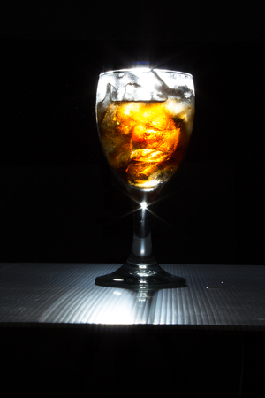 Wine glass with sparkling blackの写真素材