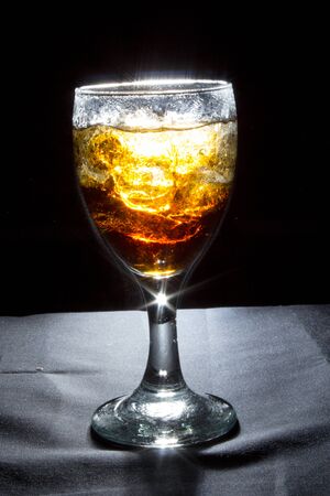 Wine glass with sparkling blackの写真素材