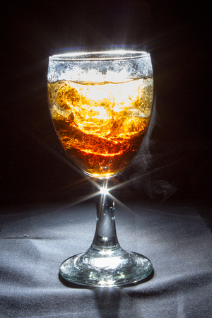 Wine glass with sparkling blackの写真素材