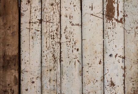 White painted wooden panels are floating old vertical.