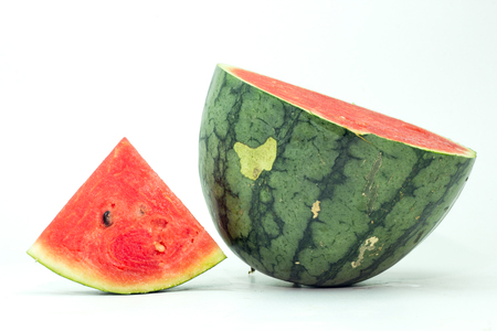 Cut and whole watermelon isolated on white background.の写真素材
