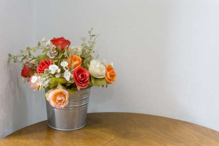 Fake flowers on the table Have space.の写真素材