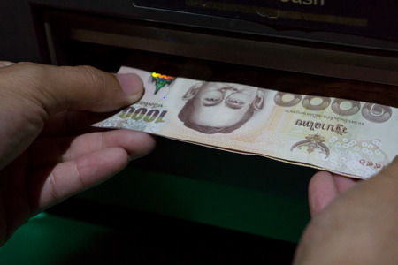 Cash dispenser, cash receiver, cash withdrawal,Banknote Thailand.