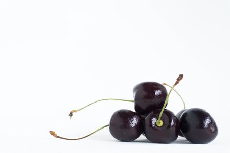 Black cherry on white background.