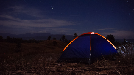 outdoors camping grass highlands mountain in the night star.の写真素材