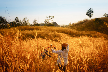 outdoors camping grass highlands mountain in the Sunset.の写真素材