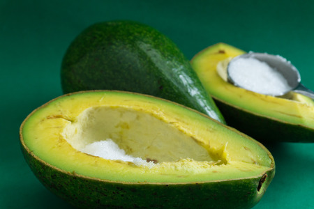 Avocado must be eaten with sugar to be delicious.の写真素材