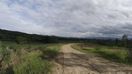 The rural route at the time before the light in the wet rainy season.