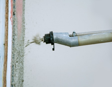 The process of automatically applying plaster (machine for applying plaster)の写真素材