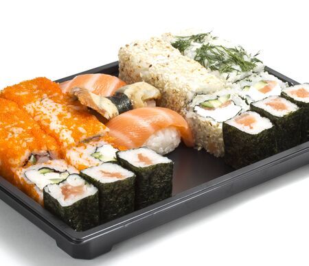 Set of sushi in black plastic boxの写真素材