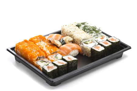 Set of sushi in black plastic boxの写真素材