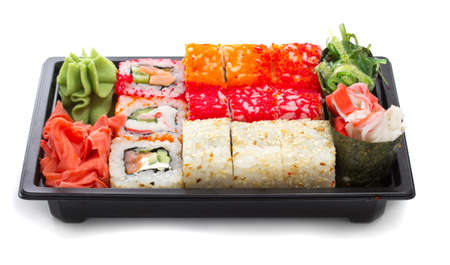 Set of sushi in black plastic boxの写真素材