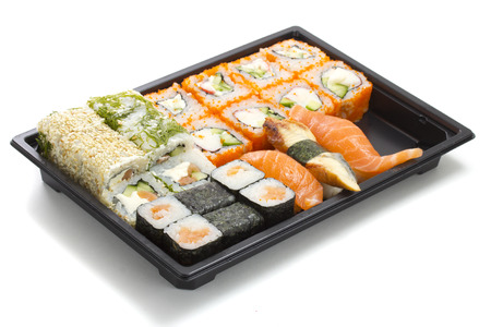 Set of sushi in black plastic boxの写真素材