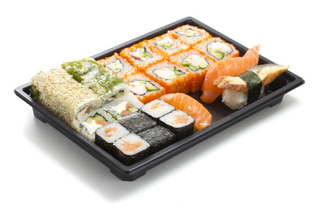 Set of sushi in black plastic boxの写真素材