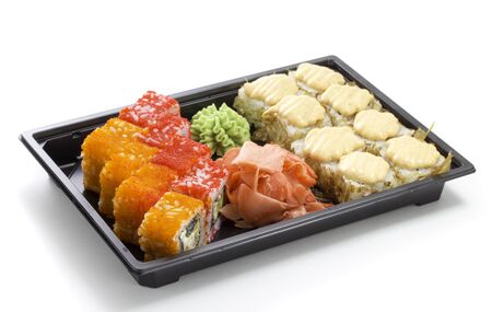 Set of sushi in black plastic boxの写真素材