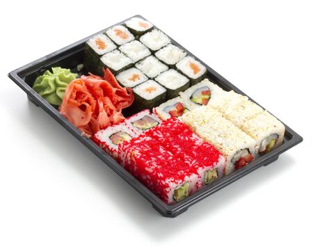 Set of sushi in black plastic boxの写真素材