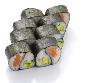 Yin yang maki sushi isolated on white の写真素材