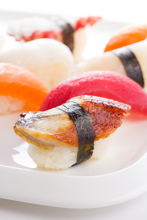 Sushi nigiri set on a white plateの写真素材