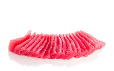 sliced tuna fillet isolated on white backgroundの写真素材