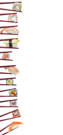 Sushi in chopsticks isolated on white backgroundの写真素材