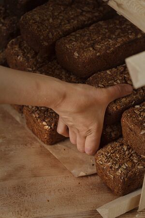 baked bread on wooden table backgroundの写真素材