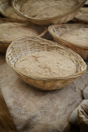 Making bread on wooden table backgroundの写真素材