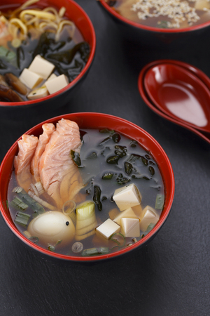Japanese cuisine.Miso soup set over black background.の写真素材
