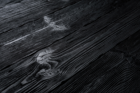 Black wooden backgroundの写真素材