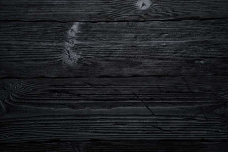 Black wooden backgroundの写真素材