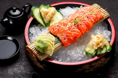 Japanese cuisine. Salmon sushi on ice.の写真素材