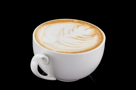 Cup of coffee over dark background.の写真素材