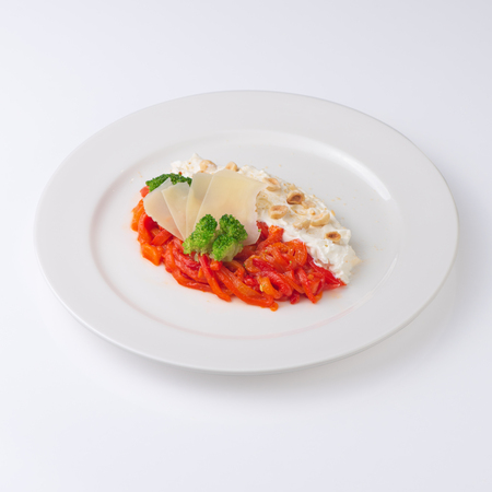 Salad with Philadelphia cheese, vegetables and parmesan. Isolated on white.の写真素材