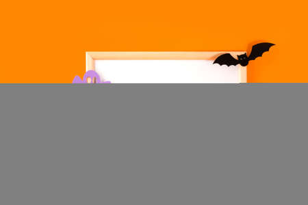 Halloween holiday concept. Jack o lantern, light, handmade paper decorations, spider, ghost, bat and blank frame on orange background. Halloween festival party, greeting card with mockup copy space.の写真素材