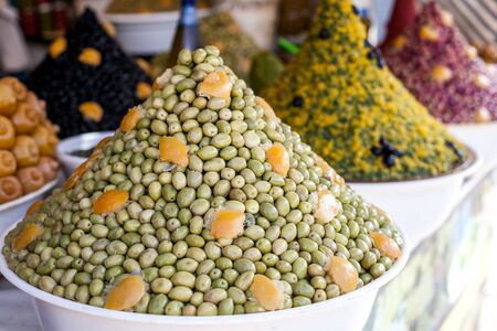 pickled olives in the marketの写真素材