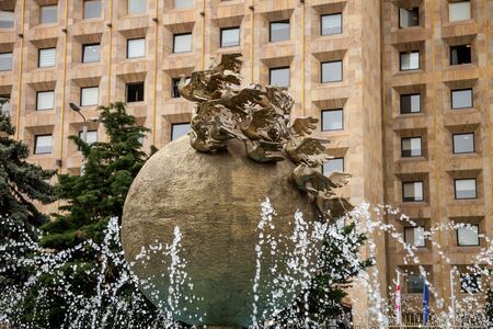 fountain with doves on the ballの写真素材