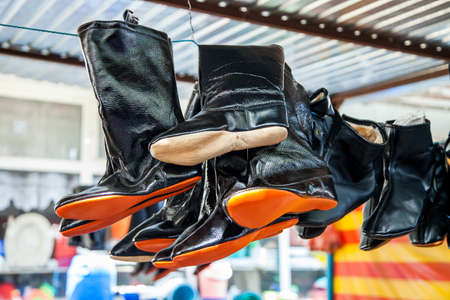 Kazakh black patent leather boots with soft solesの写真素材