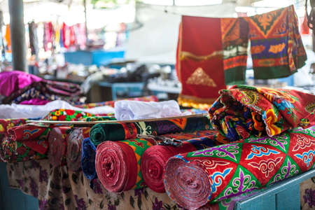 fabrics with ornaments on the national Kazakh marketの写真素材