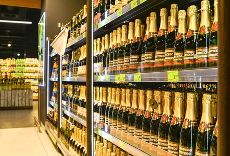 The wine section of the shop Euroopt shopping centre Gallery, the city of Minsk, February 2017. Shallow depth of field.のeditorial素材