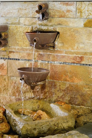 The fountain in the Greek style inside the hotel Coral Beach Hotel & Resort Cyprus in June 2017 in Cyprus PATHOSの写真素材