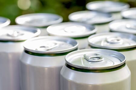 Aluminum closed white cans with beer close-up.の写真素材