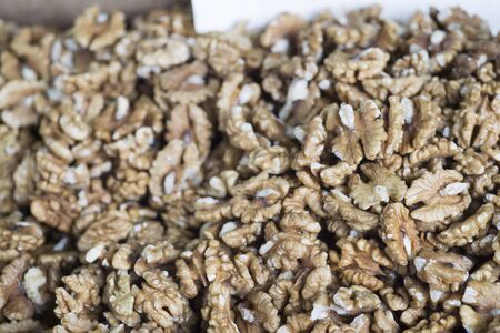 Refined grains walnuts on the counter of the store. Background. The view from the top at an angle.の写真素材