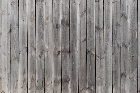 Wooden boards with nails with a naturally aged gray shade. Background.の写真素材