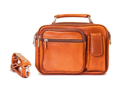 Men's vintage bag in brown color in a retro style with an unfastened strap isolated on a white background.の写真素材