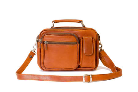 Men's vintage bag in brown color in a retro style with a fastened strap isolated on a white background.の写真素材