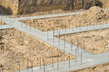 Pouring a concrete solution of the foundation of the construction of a country house. background.の写真素材
