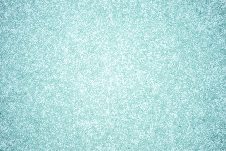 White frost pattern with illumination on a muted background with a turquoise shade. Backgroundの写真素材