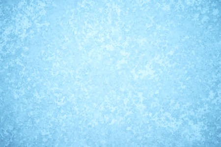 Natural beautiful ice ornament with a frozen pattern of white frost and natural illumination. background.の写真素材