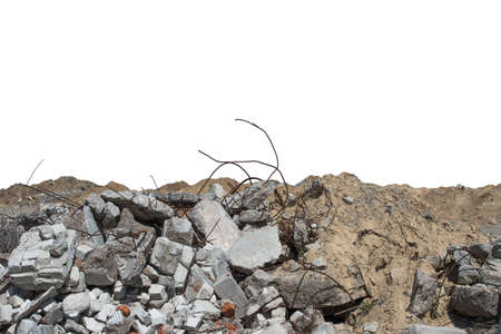 Concrete fragments with protruding reinforcement and piles of clay isolated on a white backgroundの写真素材