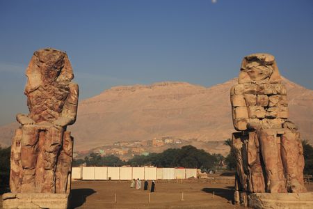 view of the Colossi of Memnon representing Amenhotep III in luxor upper egyptの写真素材